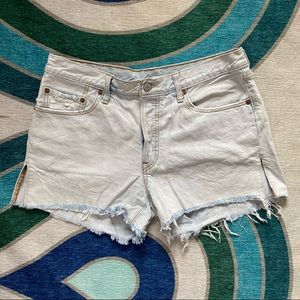 Levi’s light wash, button-fly, raw hem, denim shorts